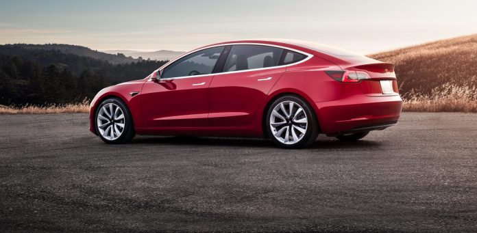 red-tesla-model-3-sunset-e1549437553845
