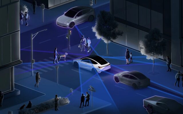 Tesla FSD mentőautó előtt utat nyitott piros lámpánál